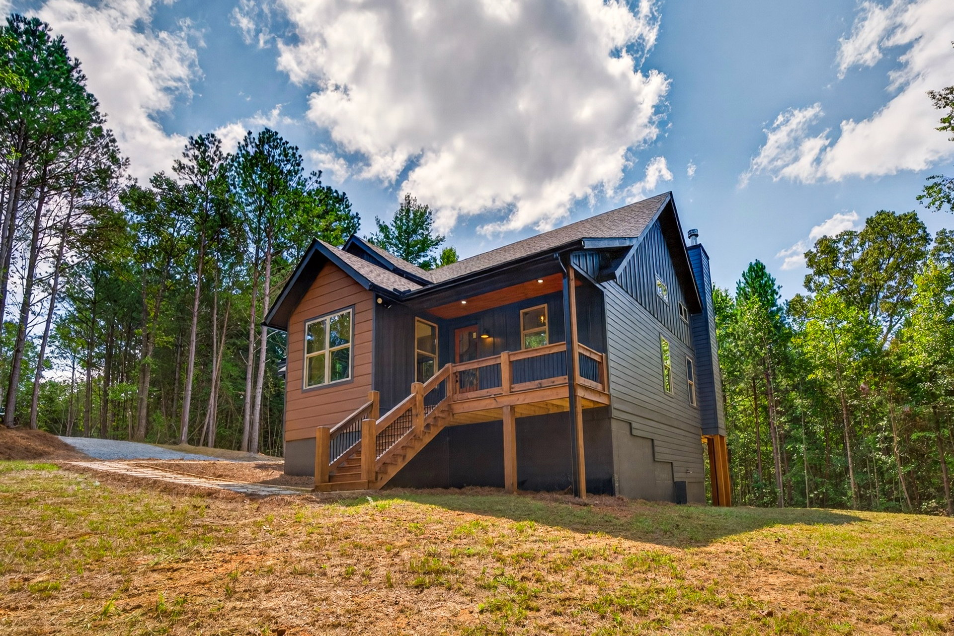Wood stairs leading to the main deck at 824 Banks Rd, Ellijay, GA